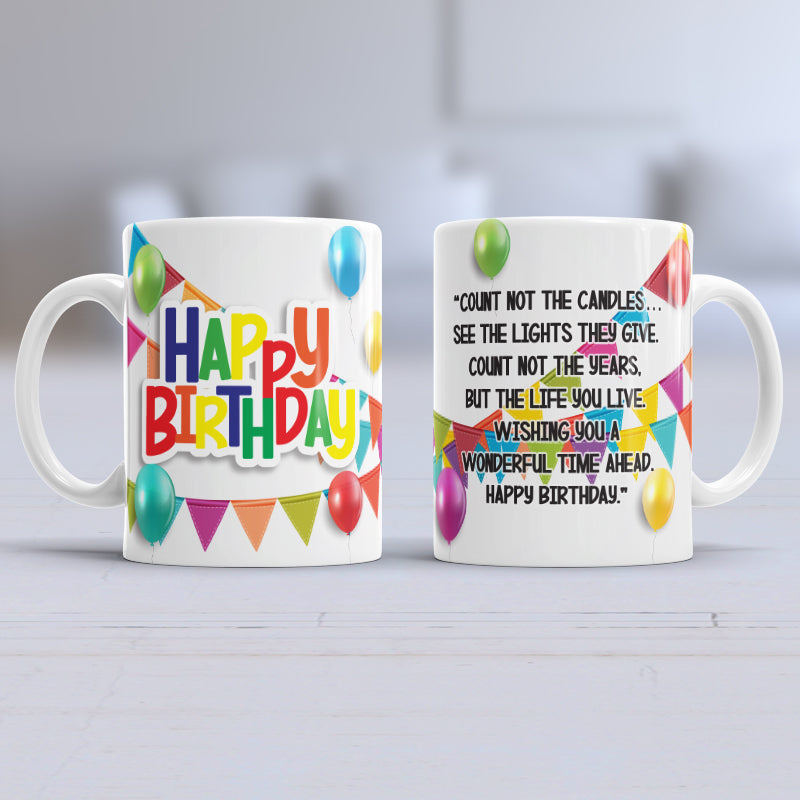 Taza colorida del feliz cumpleaños